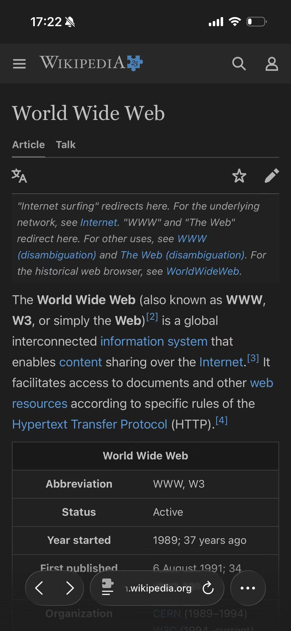 The same Wikipedia article adapted with the Soft Dark Gray theme in Safari on iPhone