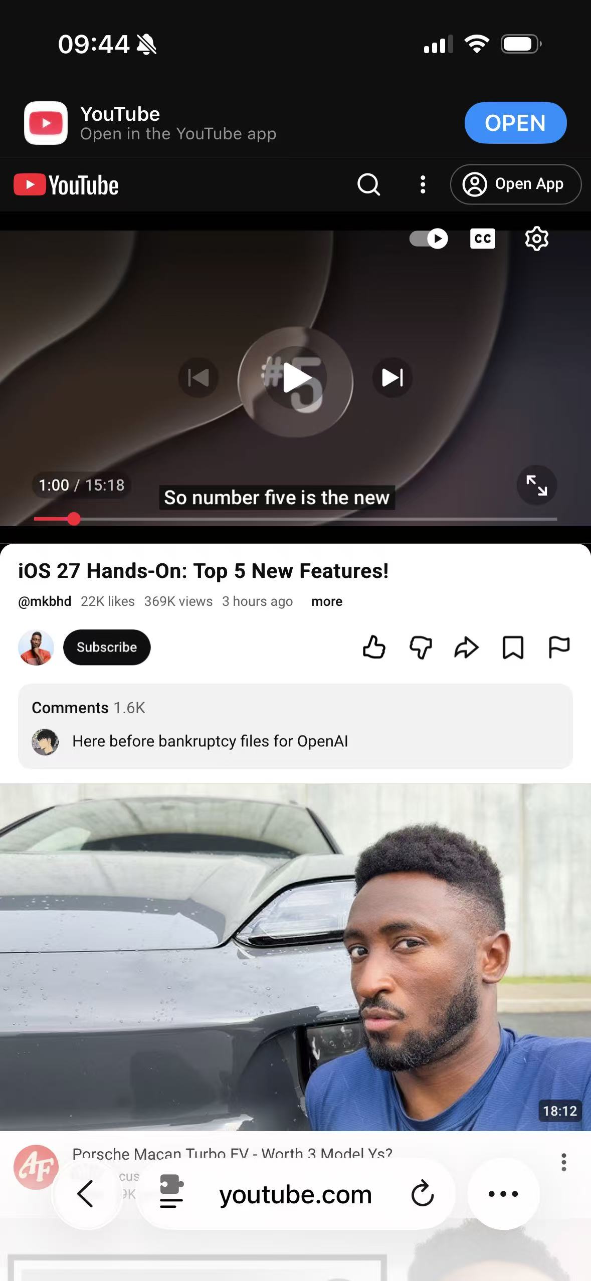 The public YouTube watch page using YouTube's Light appearance in Safari on iPhone